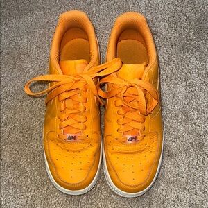 Nike Women's Sneakers in Vibrant Orange